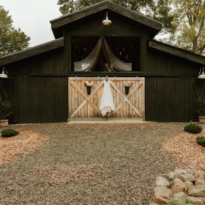 Black Barn Dress on Doors with Drapes upper